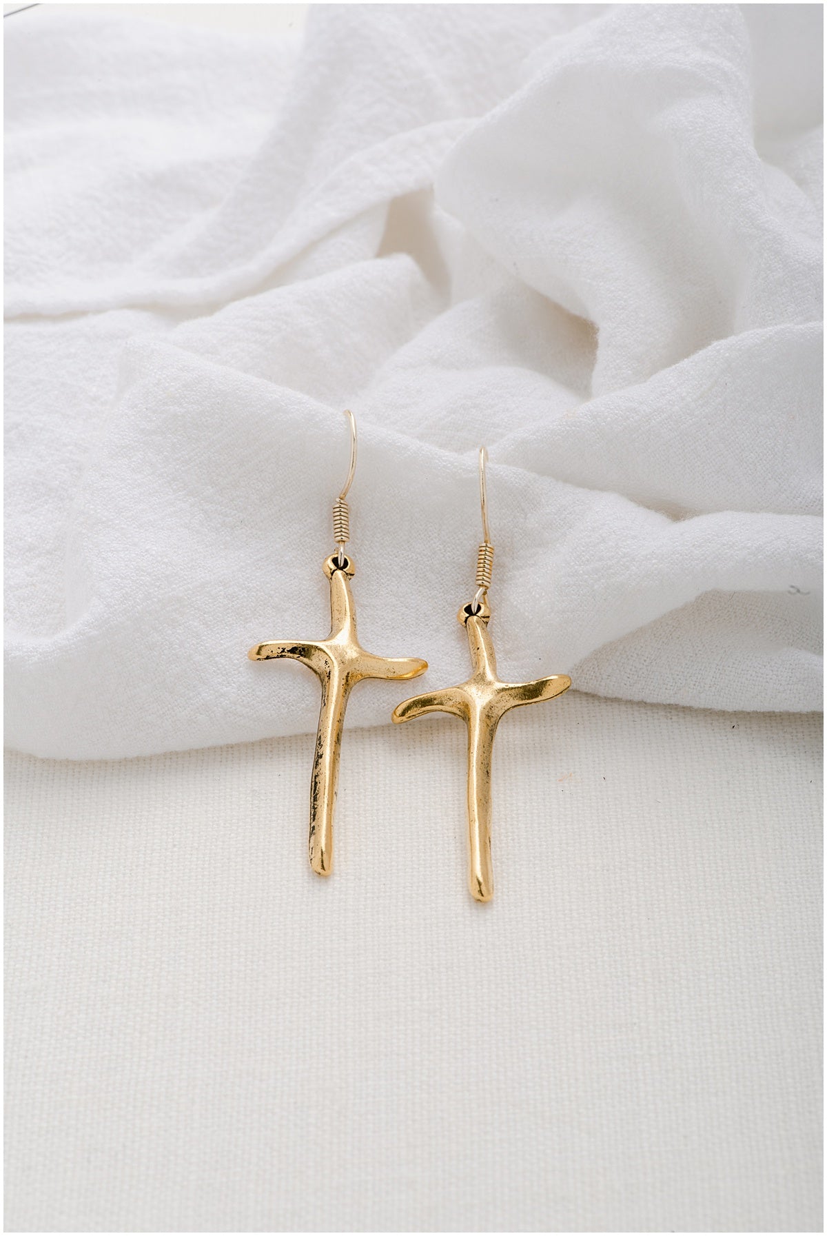 Gold, unique cross earrings.