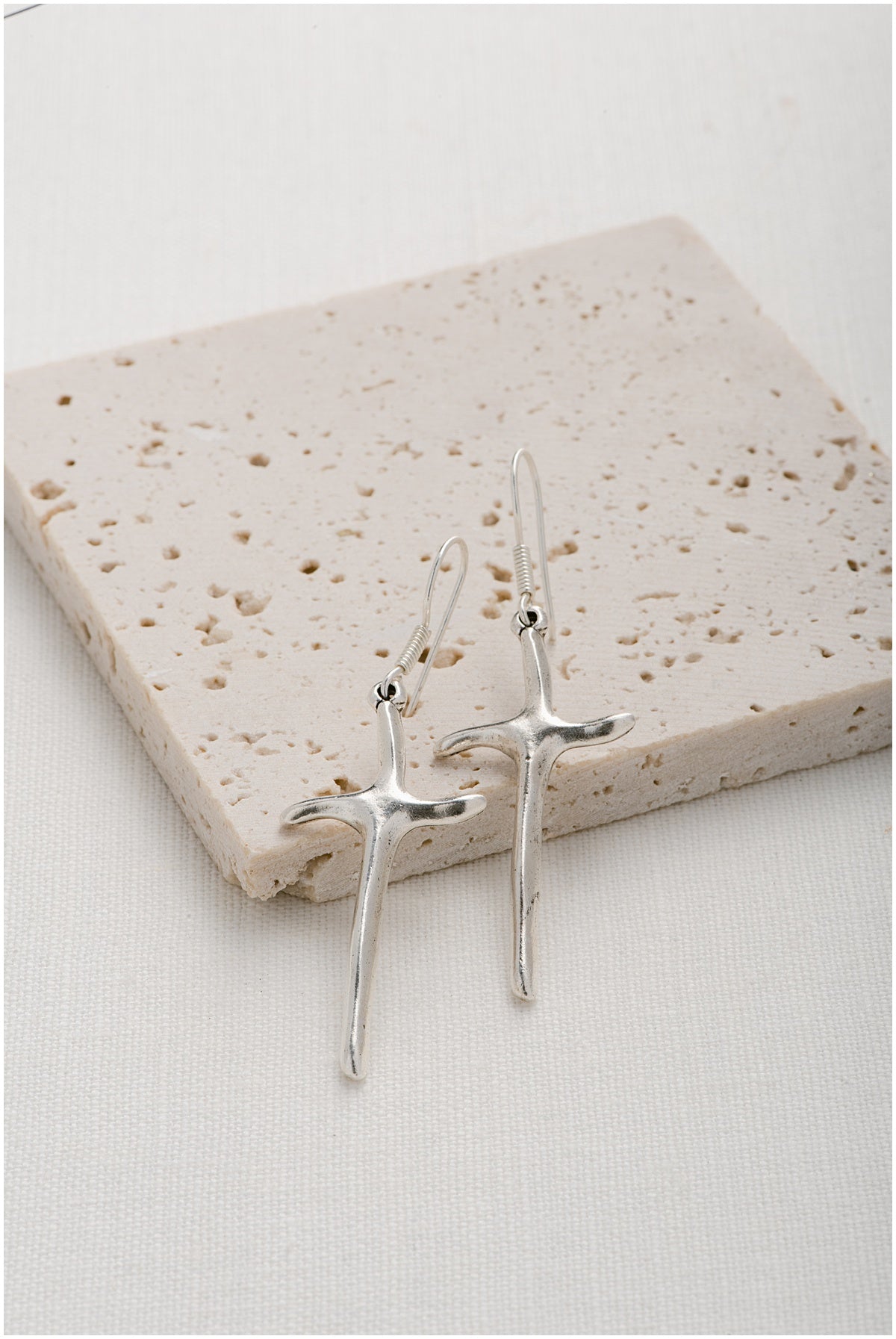 Silver, unique cross earrings.